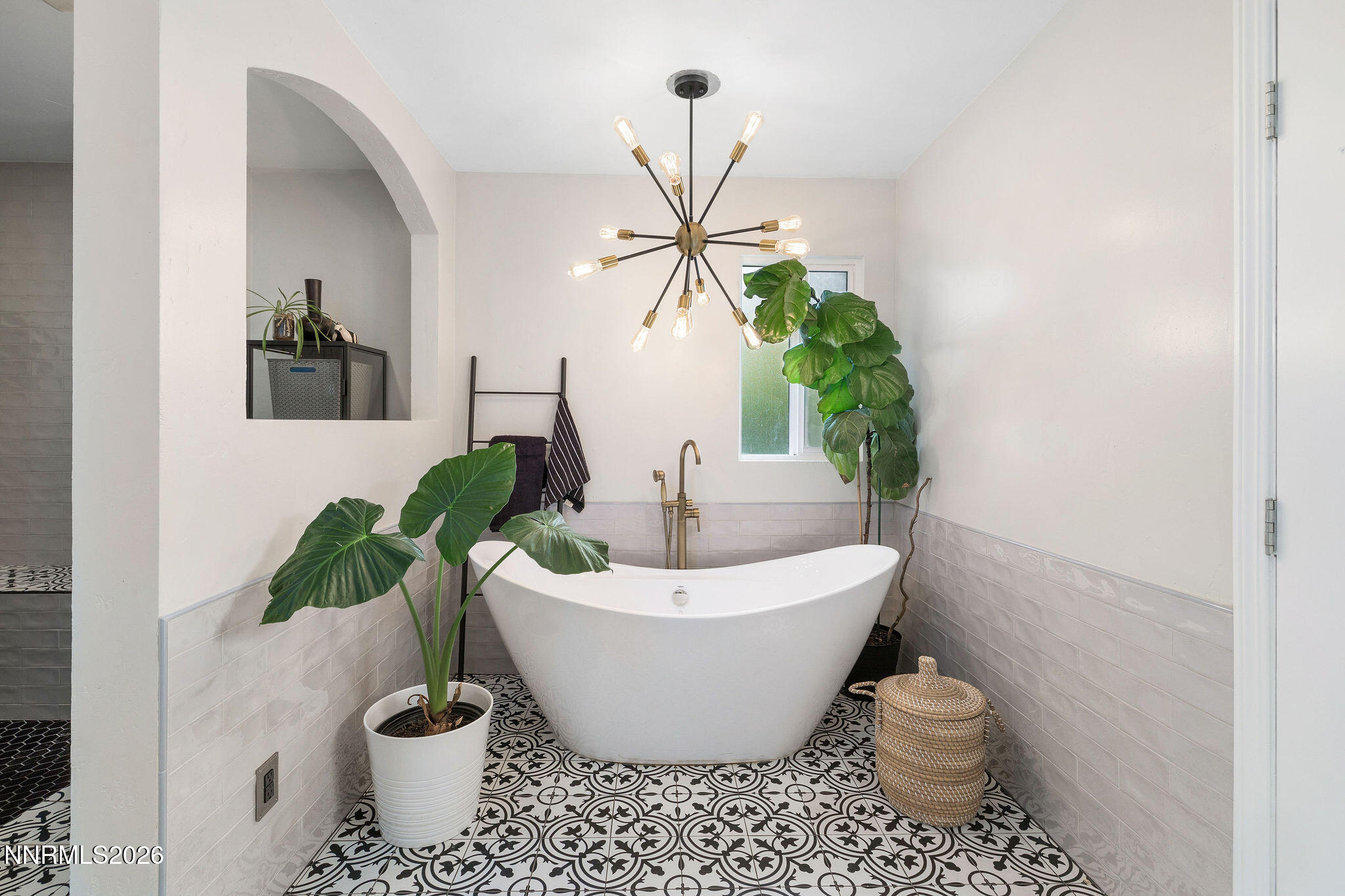 2785 Skyline Boulevard Reno, NV 89509 - Photo 32 of 65 a white bath tub sitting next to a white toilet