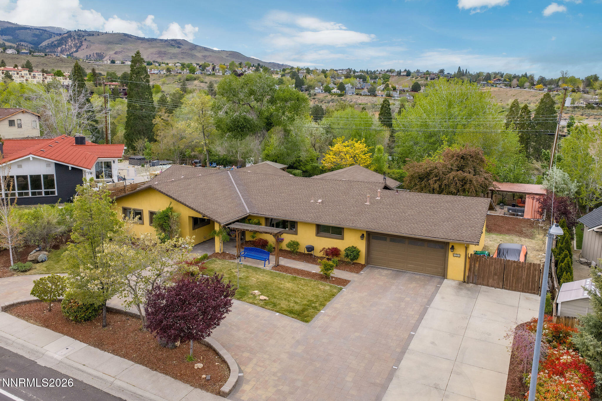 2785 Skyline Boulevard Reno, NV 89509 - Photo 60 of 65 an aerial view of a house with a garden and lake view