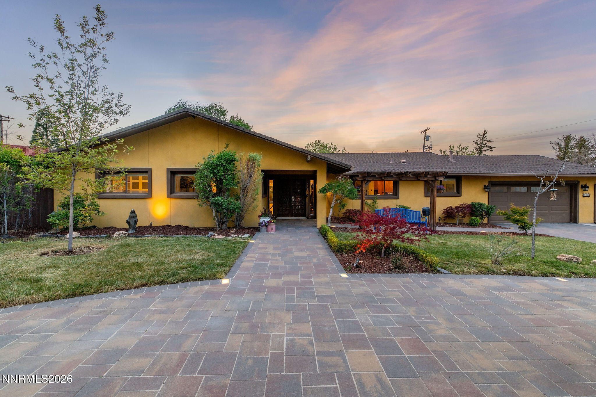 2785 Skyline Boulevard Reno, NV 89509 - Photo 61 of 65 a view of a house with a small yard and a large tree