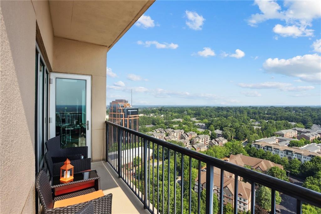 4561 Olde Perimeter Way, Unit 2609 Atlanta, GA 30346 - Photo 19 of 45 a view of a city from a balcony