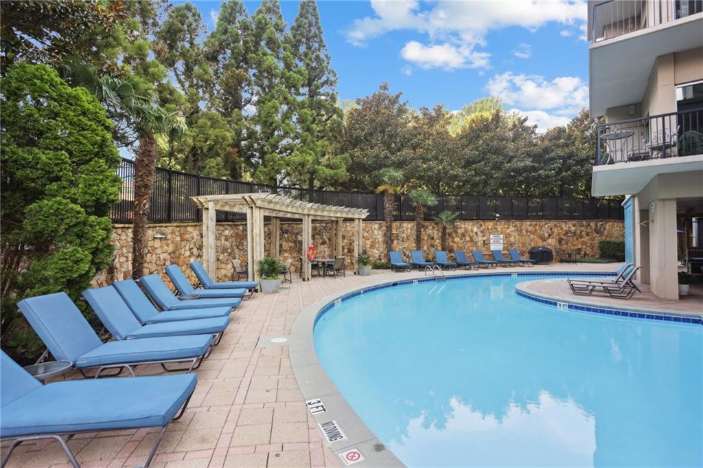 4561 Olde Perimeter Way, Unit 2609 Atlanta, GA 30346 - Photo 22 of 45 a view of a house with pool