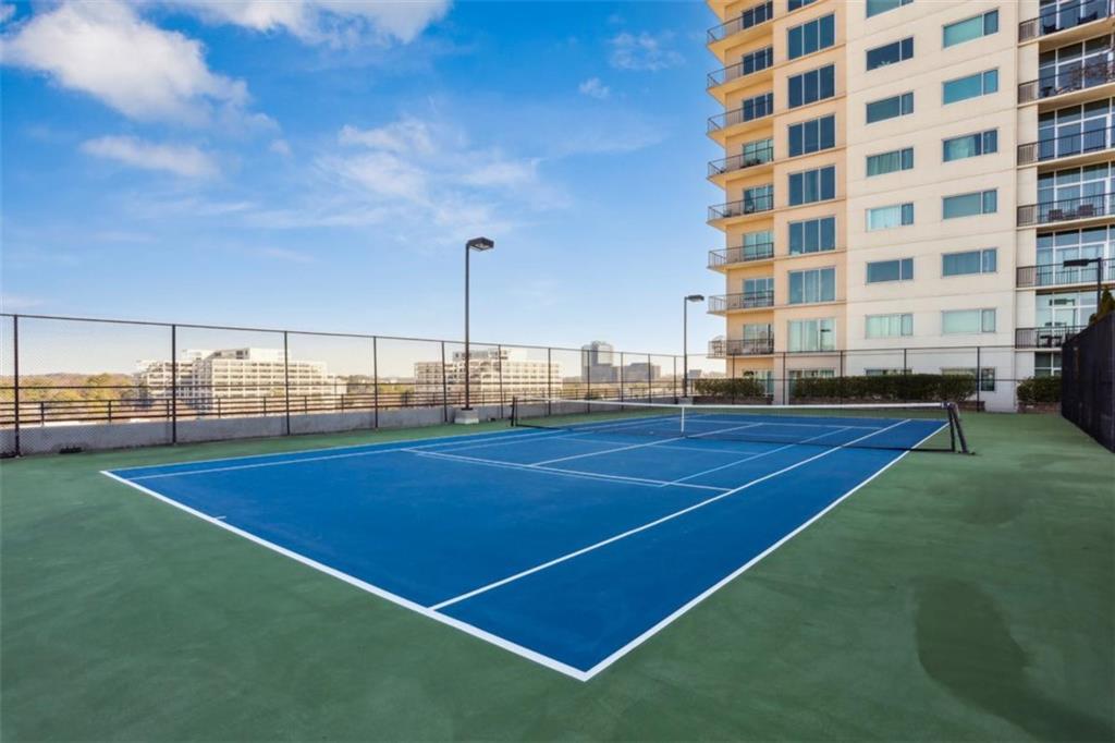 4561 Olde Perimeter Way, Unit 2609 Atlanta, GA 30346 - Photo 29 of 45 a view of a tennis court