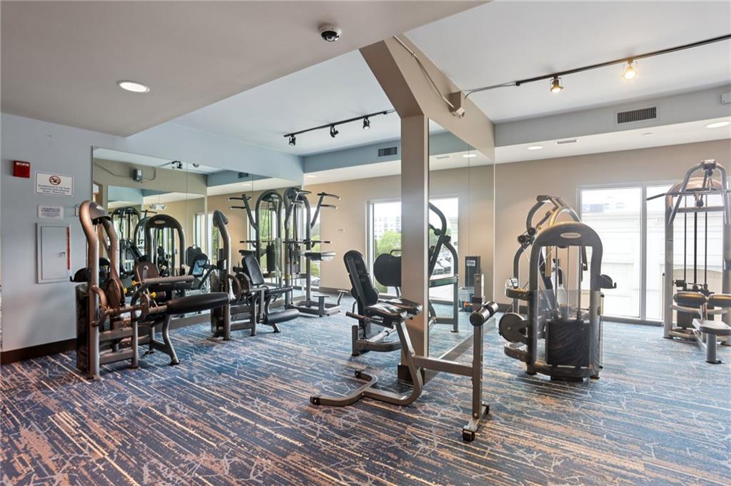 4561 Olde Perimeter Way, Unit 2609 Atlanta, GA 30346 - Photo 35 of 45 a view of a room with gym equipment
