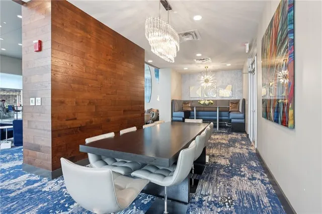 a dining room with table and chairs