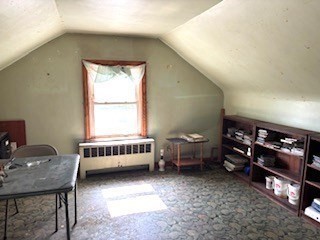 25 Lakeview Street Blackstone, MA 01504 - Photo 8 of 9 a bedroom with a bed and a window