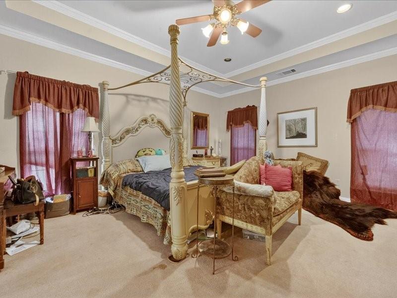 1704 South Bowen Road Pantego, TX 76013 - Photo 17 of 26 a bedroom with furniture and a bed