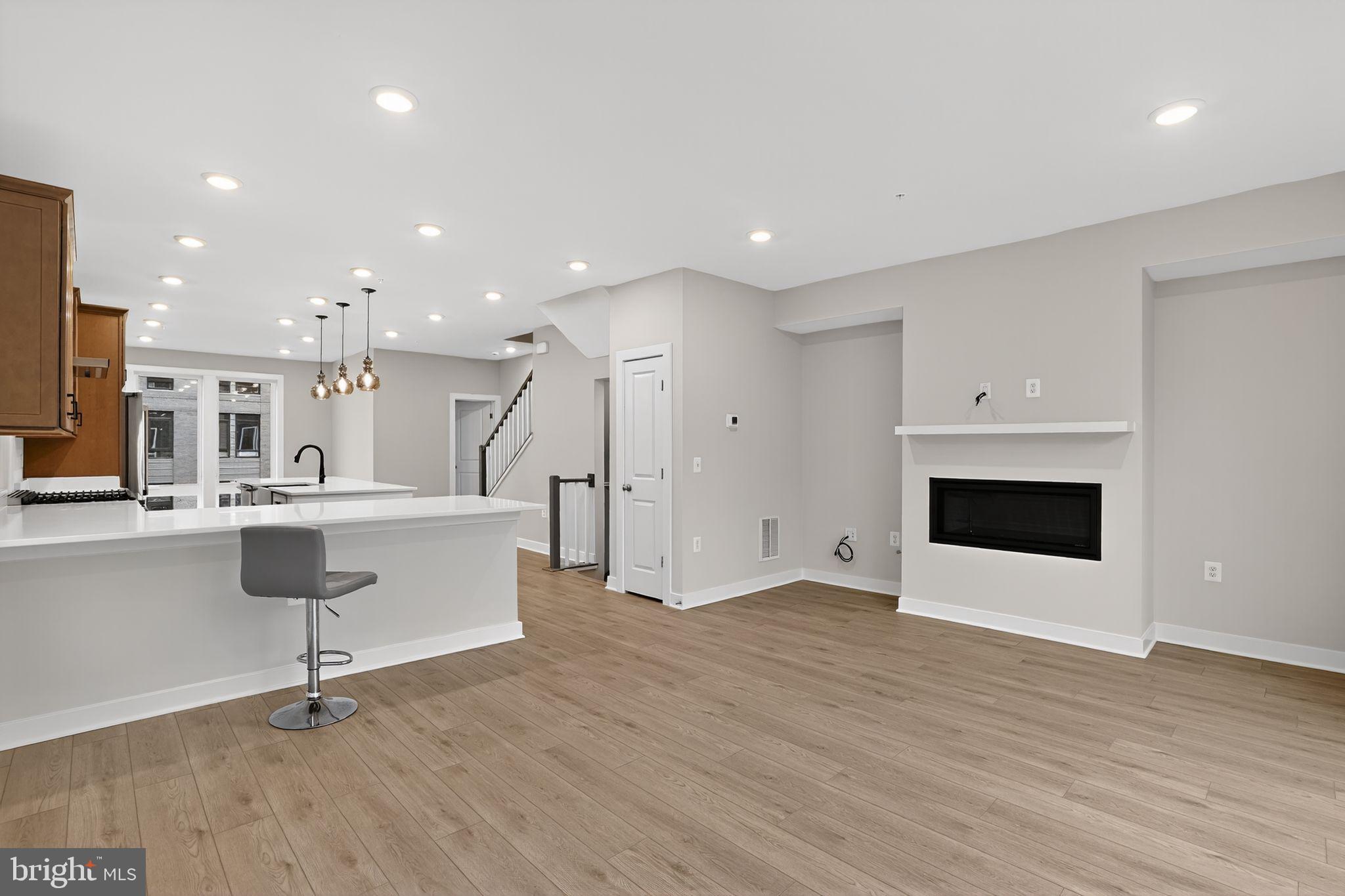 3612 Farr Avenue Fairfax, VA 22030 - Photo 13 of 30 a view of kitchen with stainless steel appliances refrigerator stove microwave and cabinets