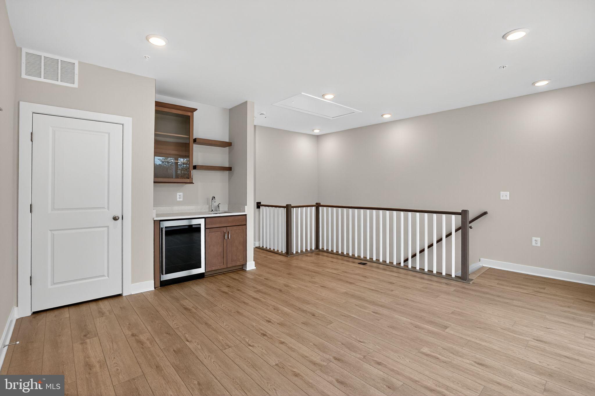 3612 Farr Avenue Fairfax, VA 22030 - Photo 22 of 30 a view of a kitchen with a sink and a stove top oven