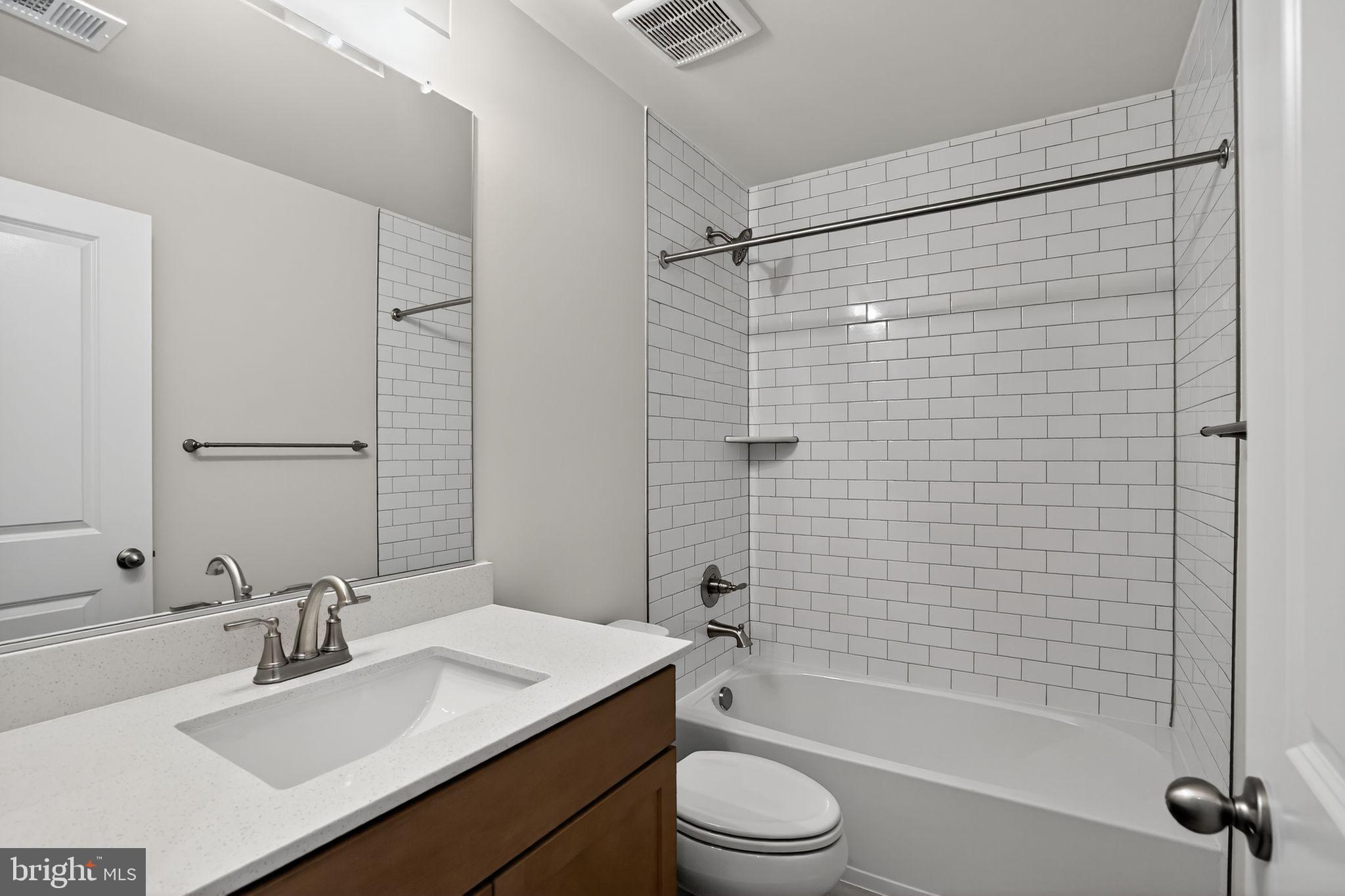 3612 Farr Avenue Fairfax, VA 22030 - Photo 26 of 30 a bathroom with a sink toilet and shower