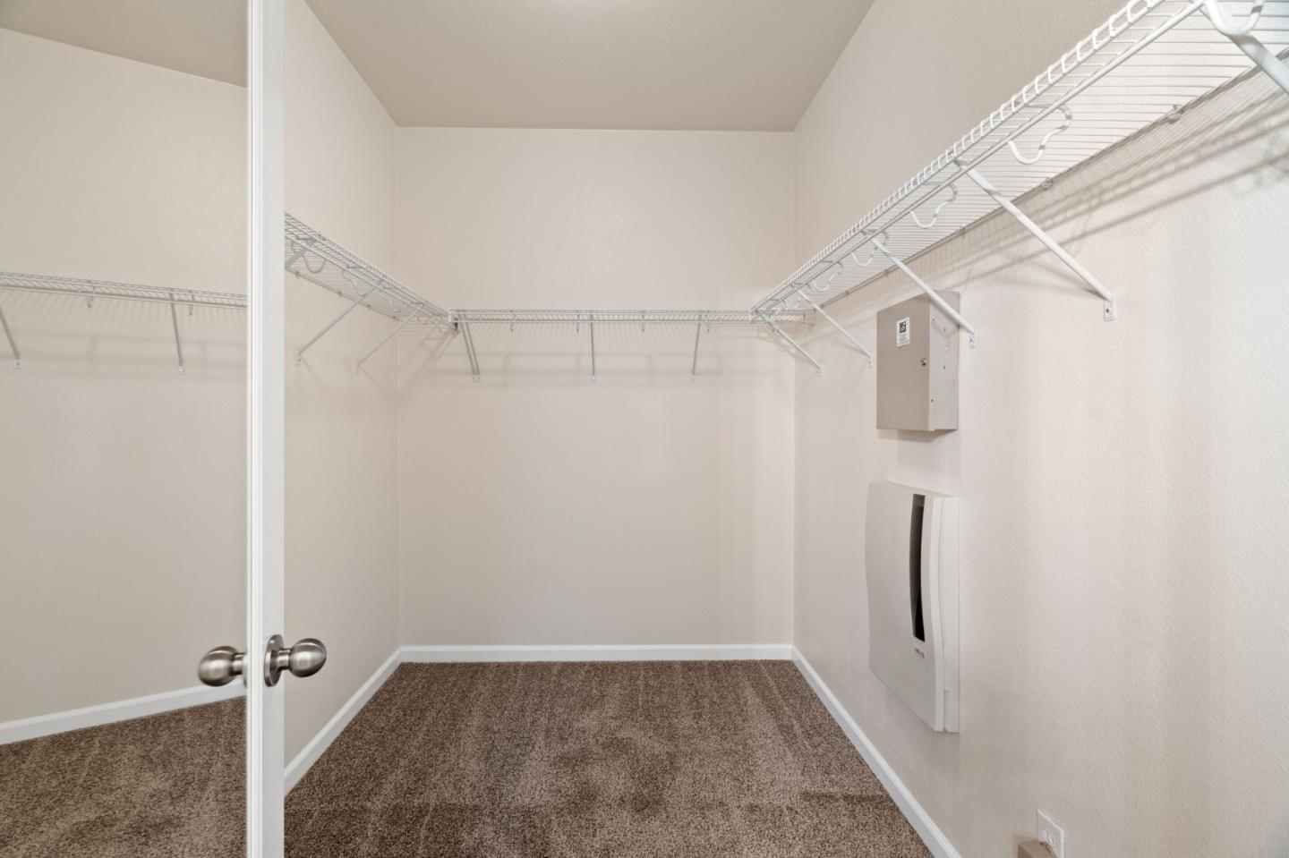 5300 Fioli Loop San Ramon, CA 94582 - Photo 22 of 43 a view of a room with walk in closet and wooden floor