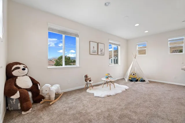 a room with toys and white walls