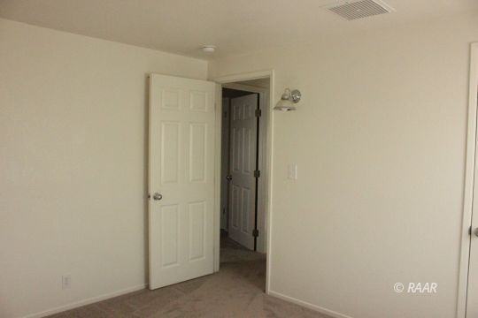 325 North Norma Street Ridgecrest, CA 93555 - Photo 24 of 25 a view of hallway with closet