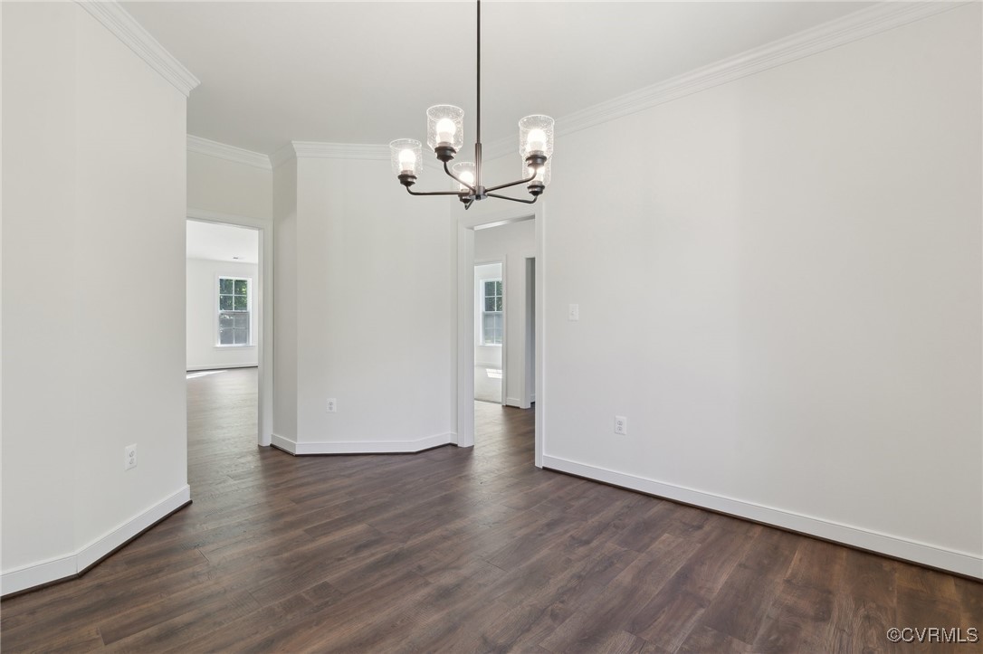 340 Rainbow Ridge Bumpass, VA 23024 - Photo 11 of 29 a view of an empty room with wooden floor and a ceiling fan