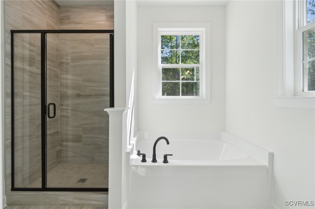 340 Rainbow Ridge Bumpass, VA 23024 - Photo 15 of 29 a bathroom with a bathtub