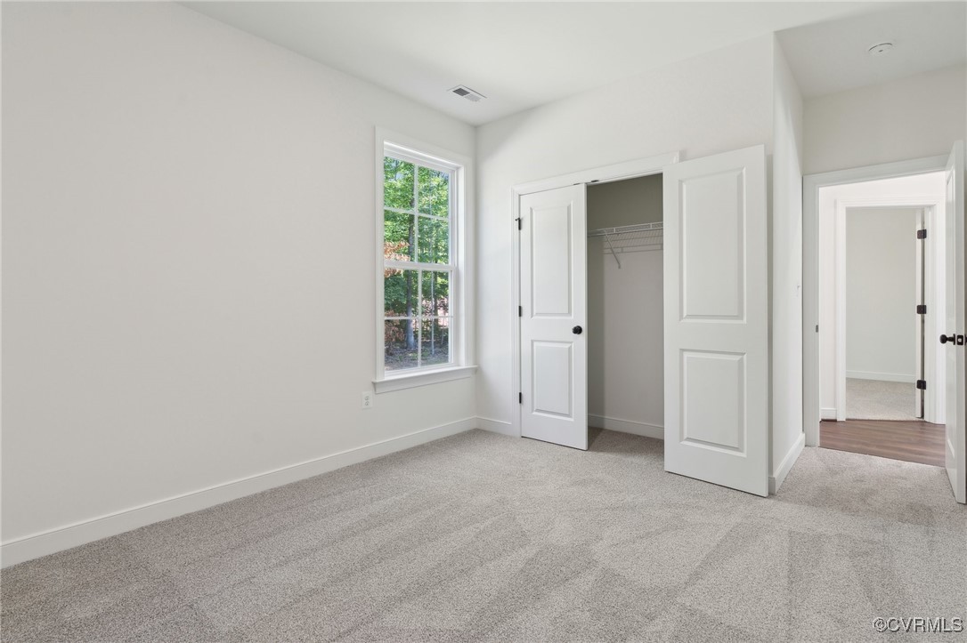 340 Rainbow Ridge Bumpass, VA 23024 - Photo 18 of 29 an empty room with windows and closet