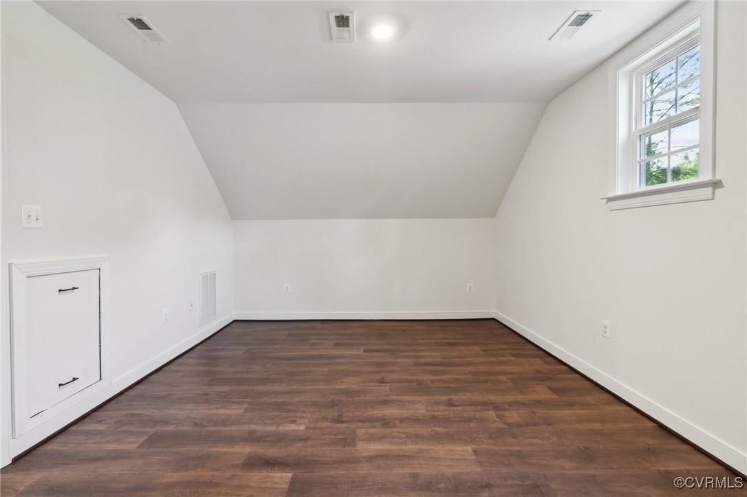 340 Rainbow Ridge Bumpass, VA 23024 - Photo 19 of 29 an empty room with wooden floor and windows