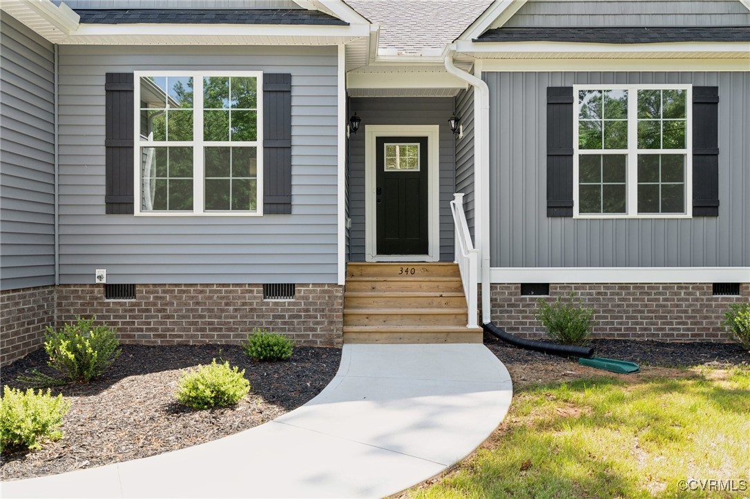 340 Rainbow Ridge Bumpass, VA 23024 - Photo 20 of 29 a front view of a house having yard