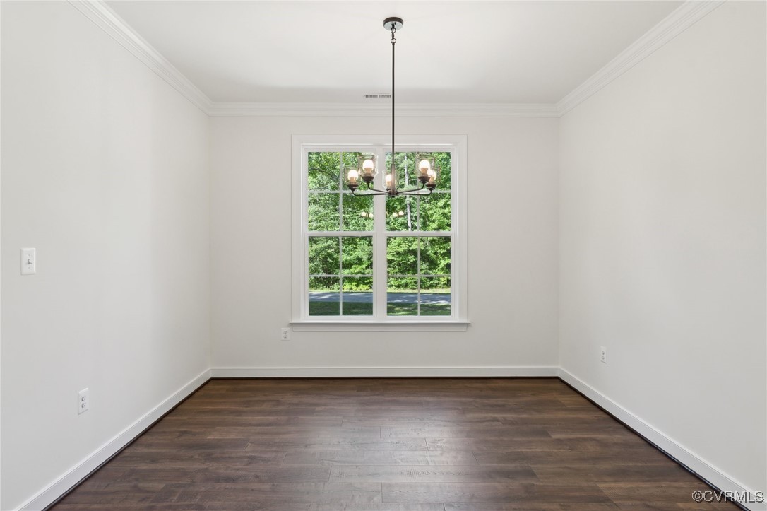 340 Rainbow Ridge Bumpass, VA 23024 - Photo 10 of 29 an empty room with wooden floor and windows