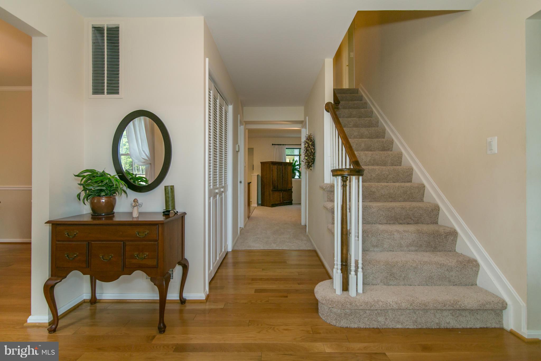 10819 Cross School Road Reston, VA 20191 - Photo 3 of 30 a view of entryway and hall with wooden floor