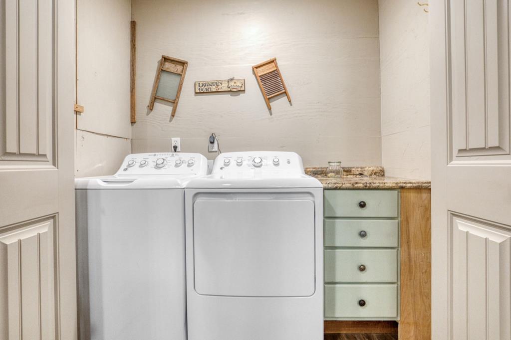 25525 Ranch Road 2323 Llano, TX 78643 - Photo 27 of 40 a utility room with dryer and washer