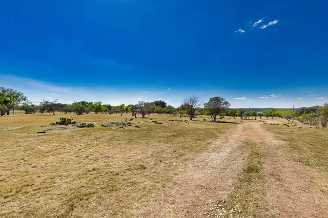 a view of a swimming pool with an ocean view