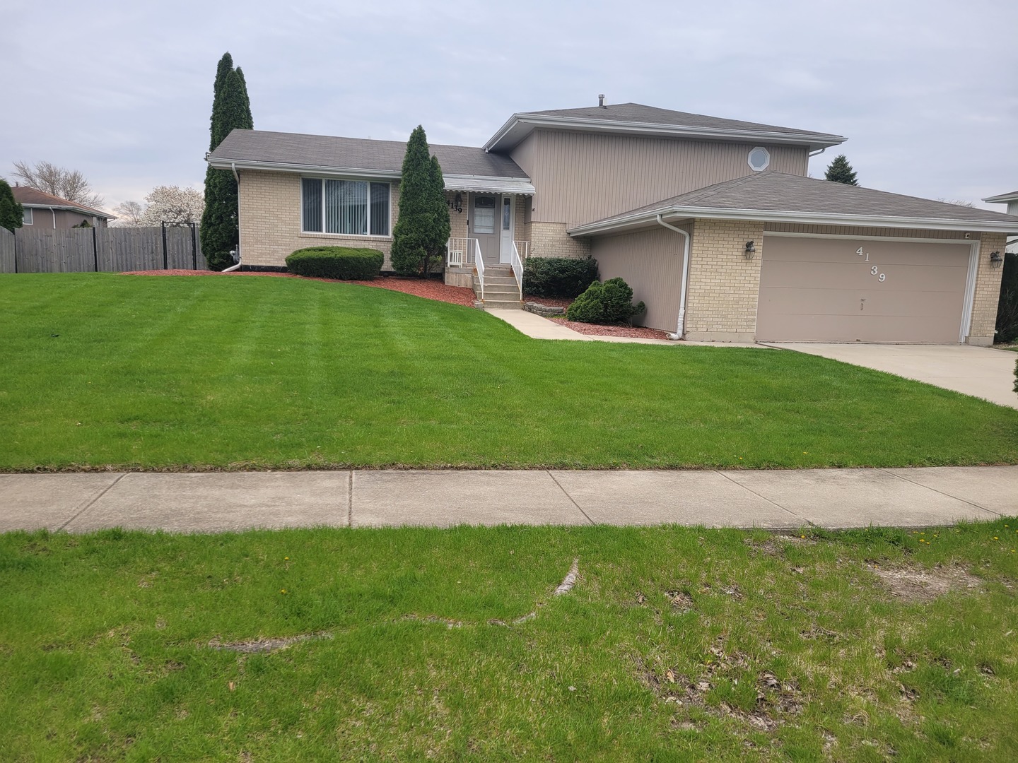 4139 Charleston Road Matteson, IL 60443 - Photo 3 of 33 a view of a house with a garden