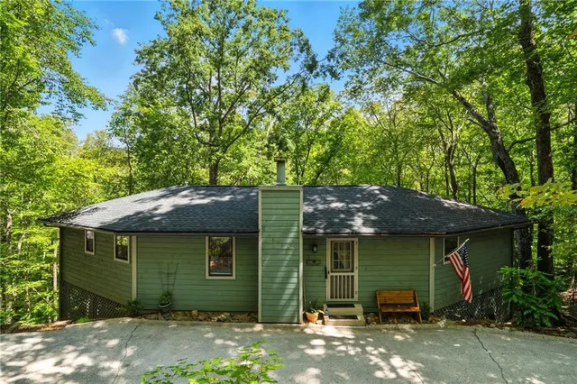 a view of a house with a garden