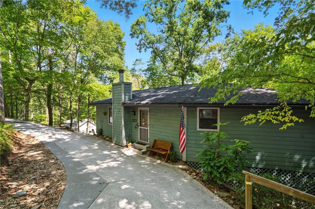816 Mulligan Way Jasper, GA 30143 - Photo 2 of 36 a backyard of a house with seating space