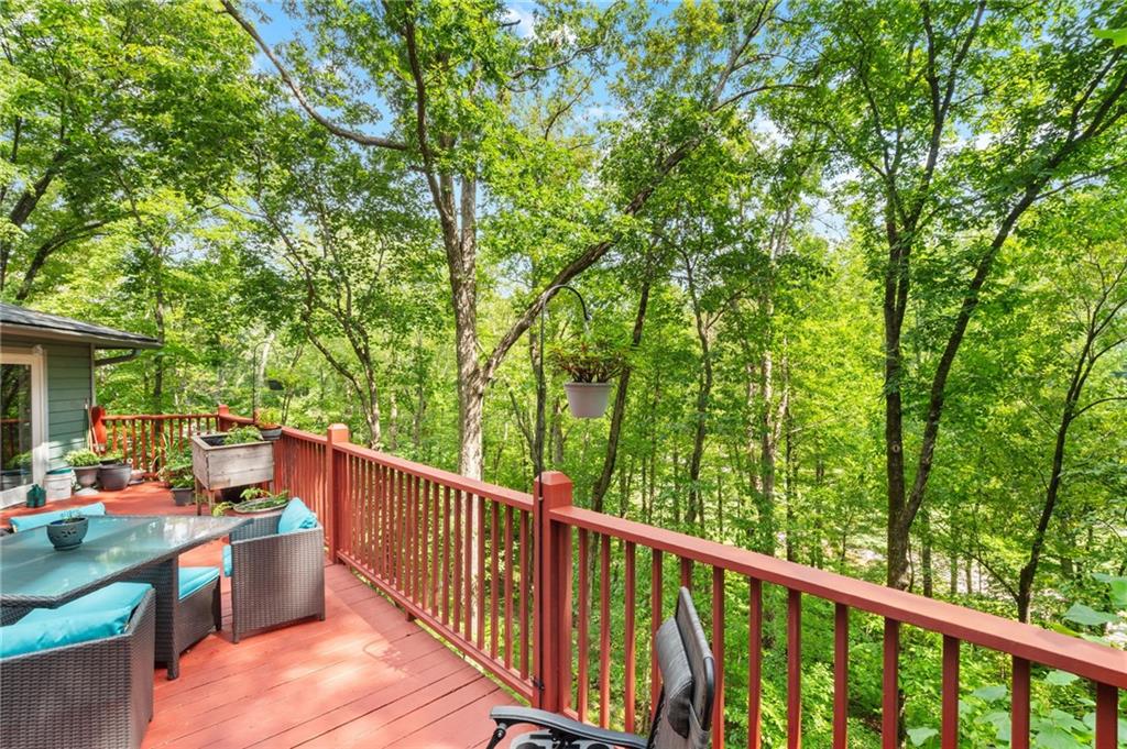 816 Mulligan Way Jasper, GA 30143 - Photo 29 of 36 a view of a balcony with furniture