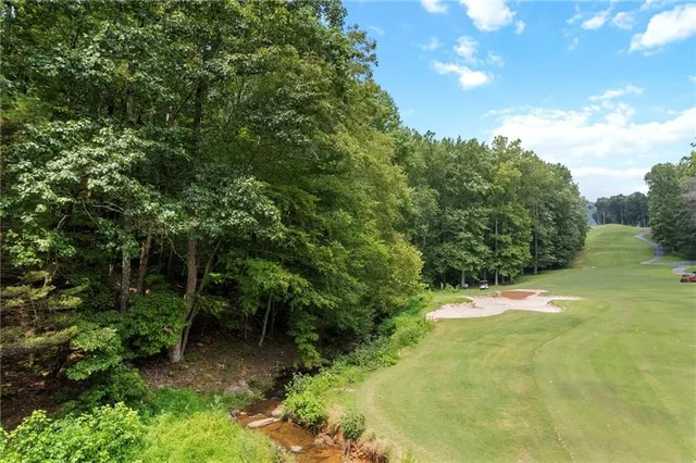 a backyard of a house with a seating space and deck