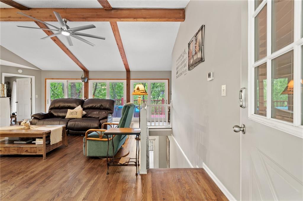 816 Mulligan Way Jasper, GA 30143 - Photo 6 of 36 a view of a livingroom with workspace and a window