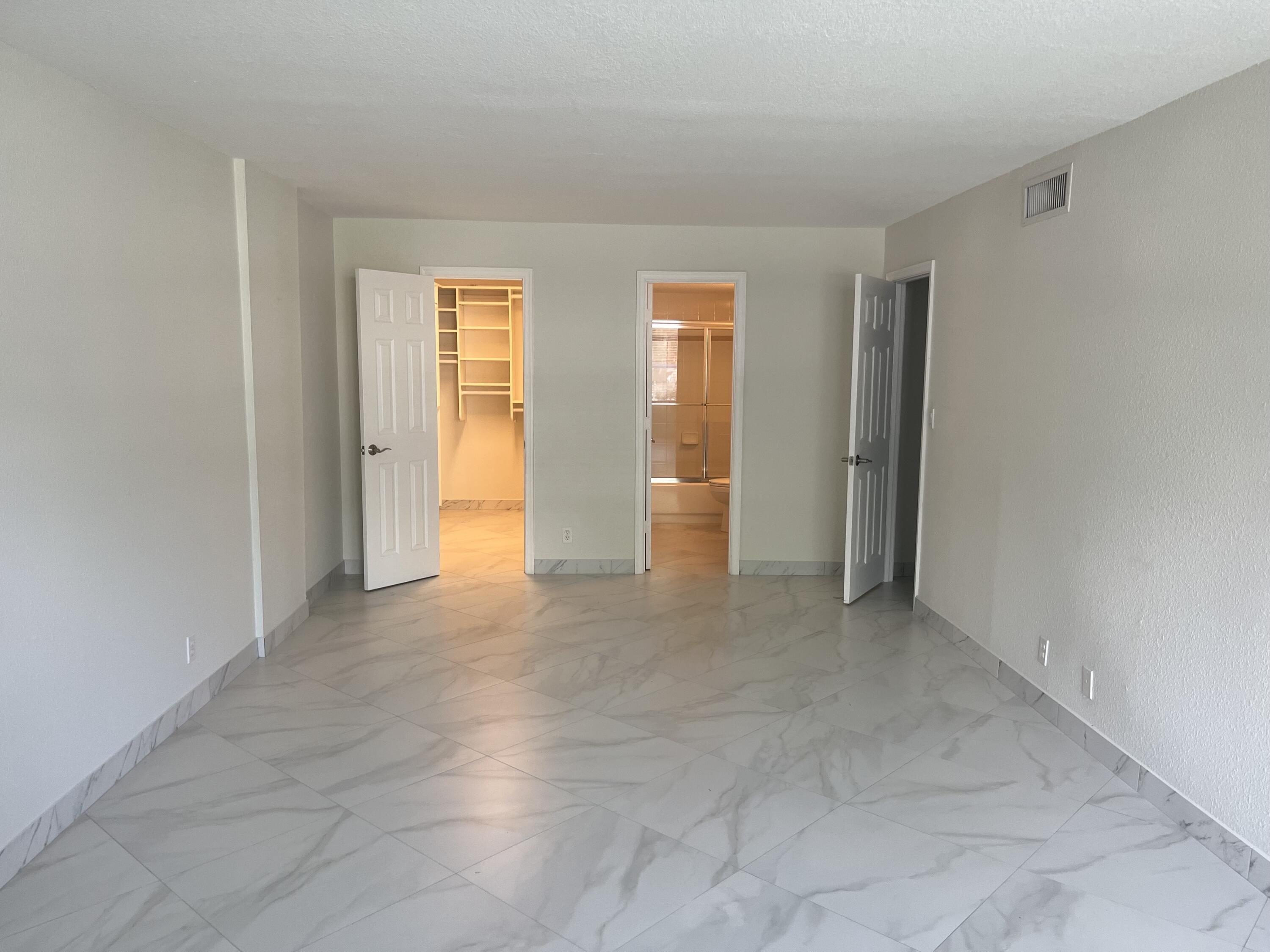 1000 Spanish River Road, Unit 1F Boca Raton, FL 33432 - Photo 20 of 29 Primary Bedroom