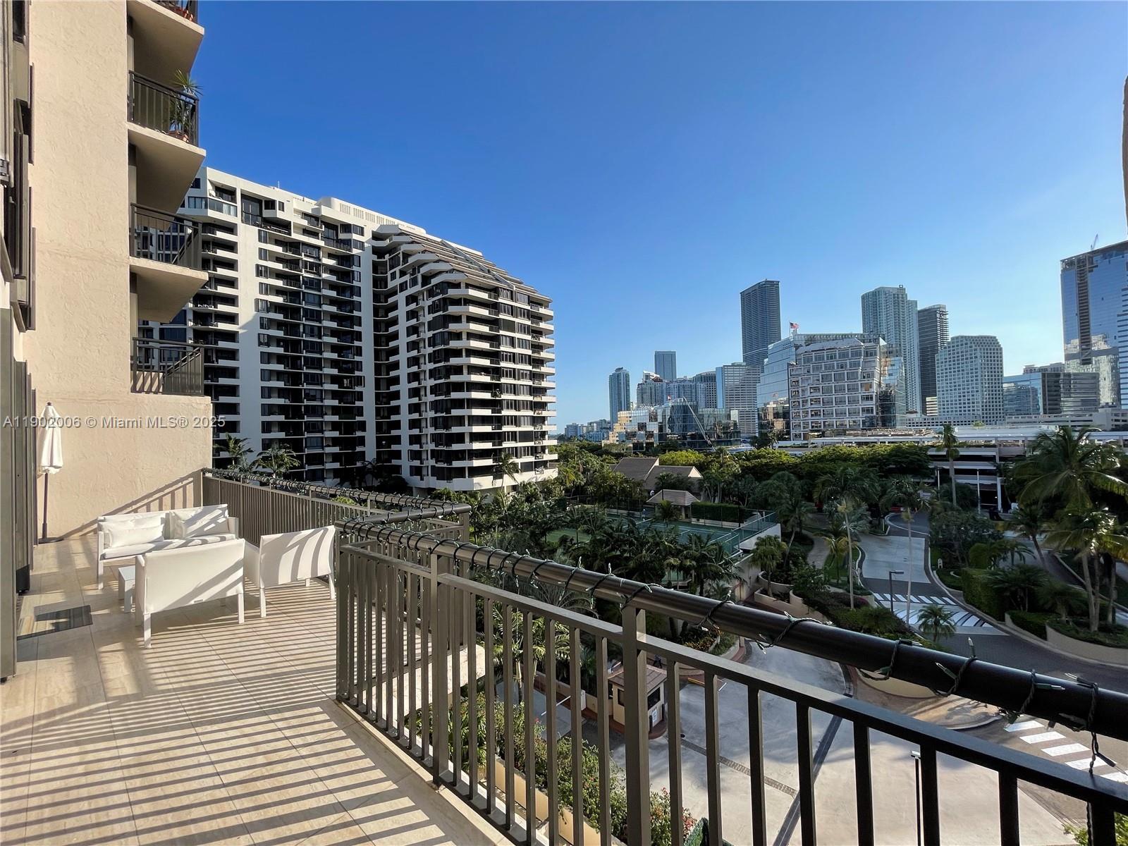 540 Brickell Key Drive, Unit 711 Miami, FL 33131 - Photo 33 of 37 a view of balcony with outdoor seating and city view