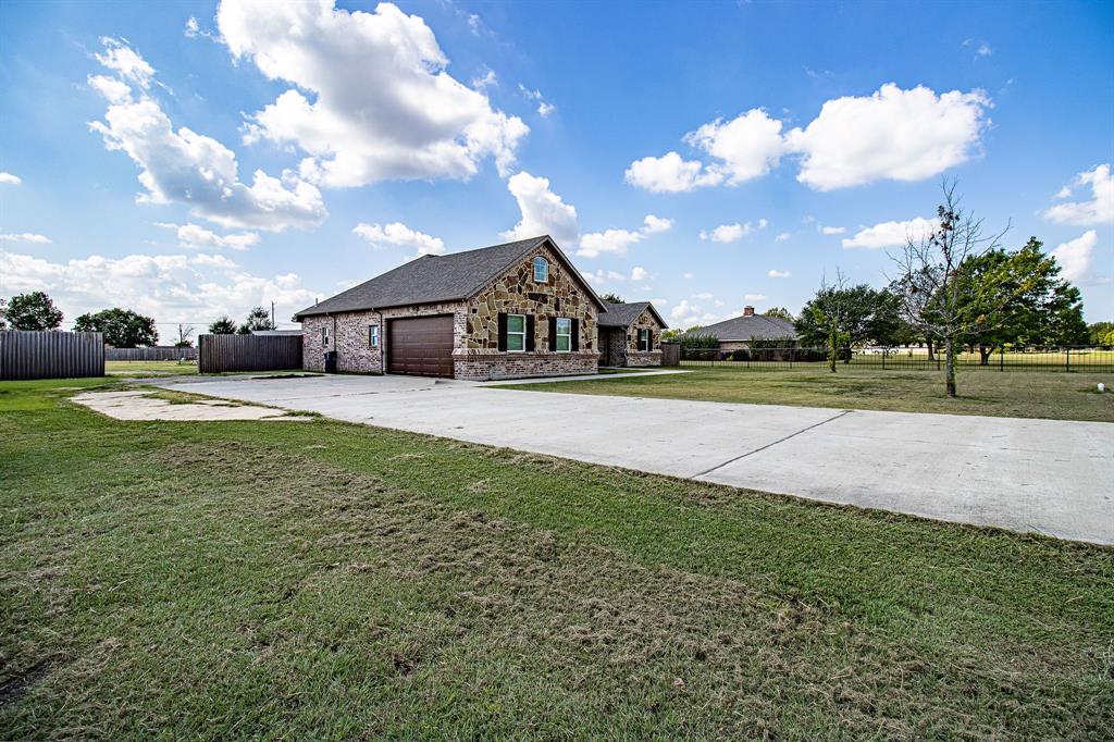 328 Meadow Lane Red Oak, TX 75154 - Photo 28 of 35 View of front of house featuring brick siding, driveway, and a garage