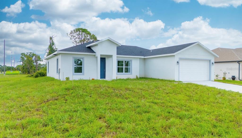 46 Master Drive Placida, FL 33946 - Photo 14 of 44 a view of a house with backyard and garden