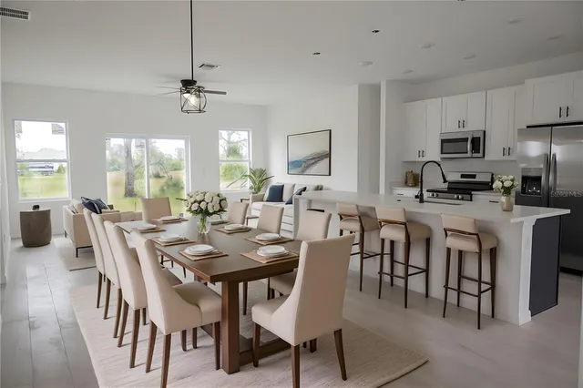 a view of a dining room with furniture