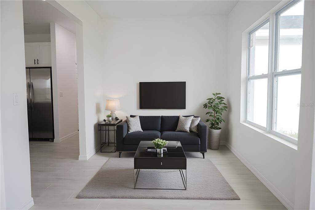 46 Master Drive Placida, FL 33946 - Photo 19 of 44 a living room with furniture and a flat screen tv