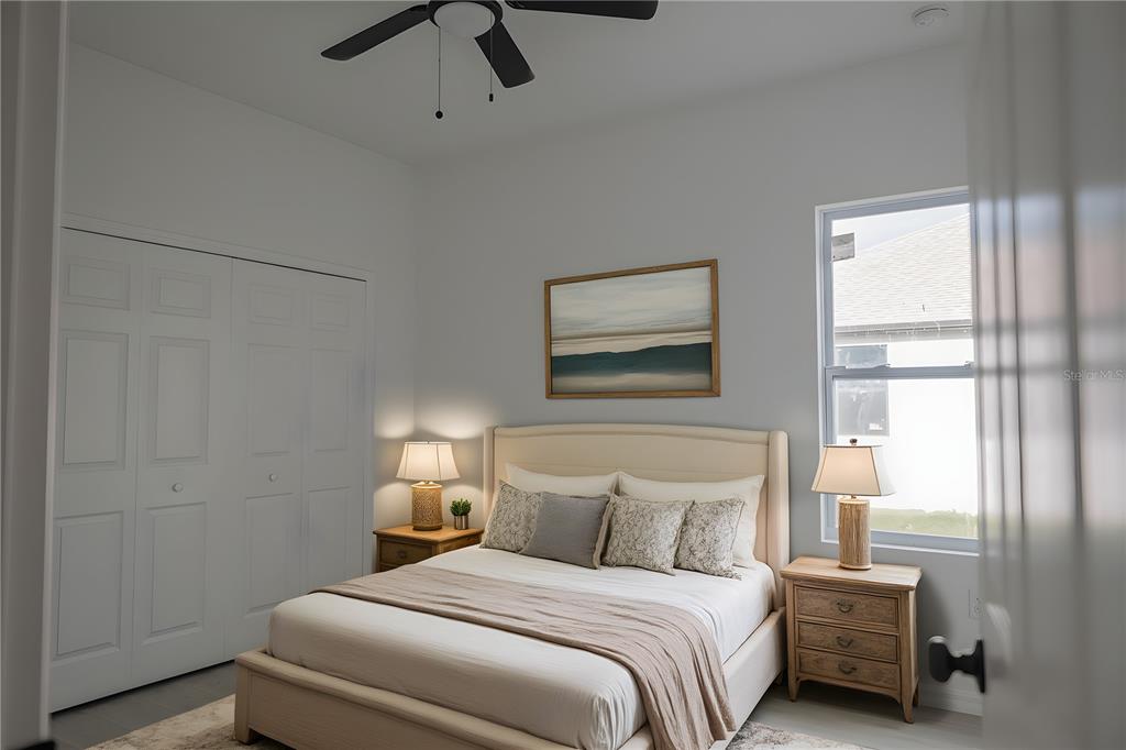 46 Master Drive Placida, FL 33946 - Photo 26 of 44 a bedroom with a bed and a window