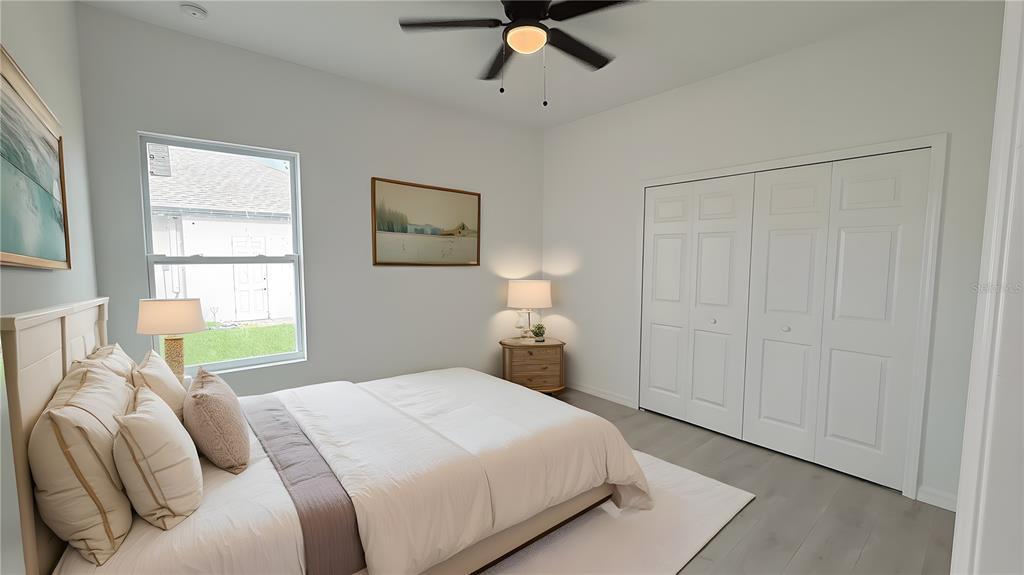 46 Master Drive Placida, FL 33946 - Photo 28 of 44 a bedroom with a bed and a window