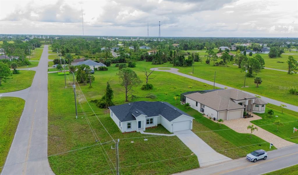 46 Master Drive Placida, FL 33946 - Photo 9 of 44 an aerial view of a house with outdoor space and street view