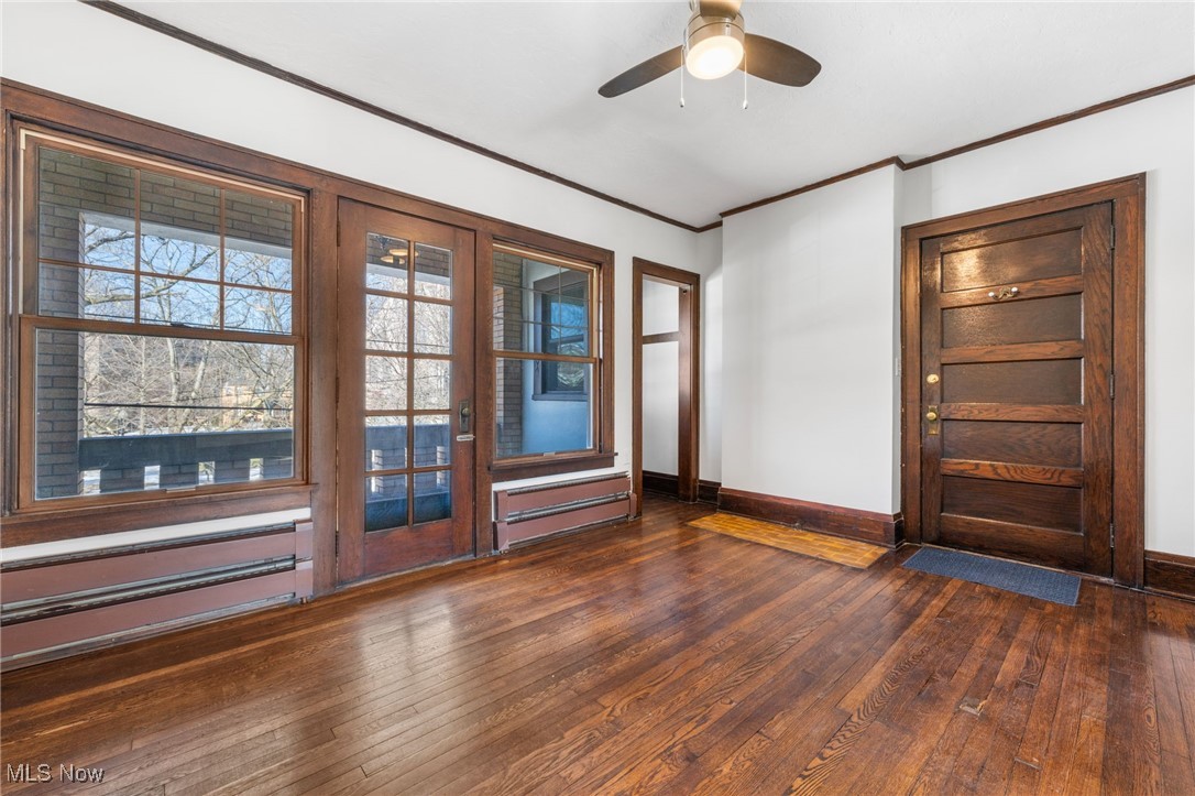 1905 Fulton Road, Unit 2B Cleveland, OH 44113 - Photo 7 of 31 Entryway featuring ornamental molding, dark hardwood / wood-style floors, and ceiling fan