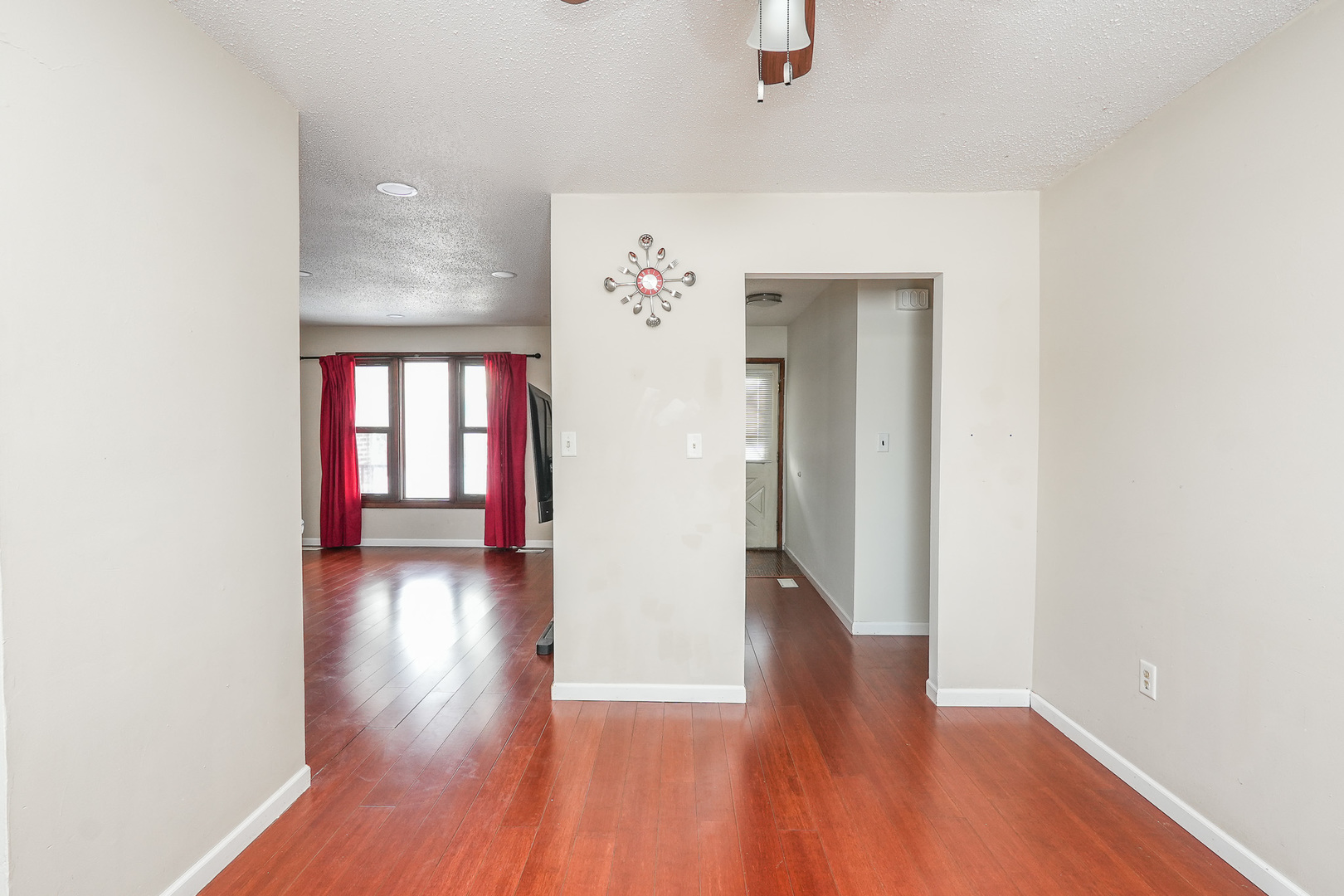 165 East Baker Street Manteno, IL 60950 - Photo 11 of 38 a view of a hallway with wooden floor