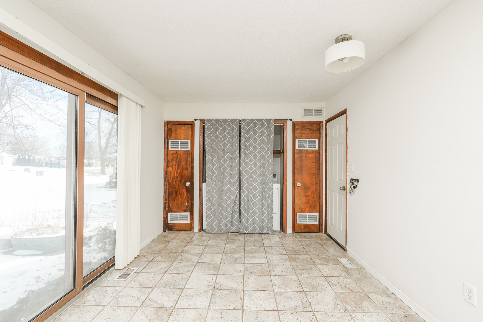 165 East Baker Street Manteno, IL 60950 - Photo 17 of 38 a view of an empty room and window
