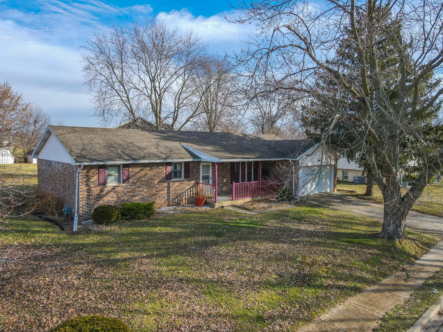 165 East Baker Street Manteno, IL 60950 - Photo 2 of 38 a view of a house with a yard
