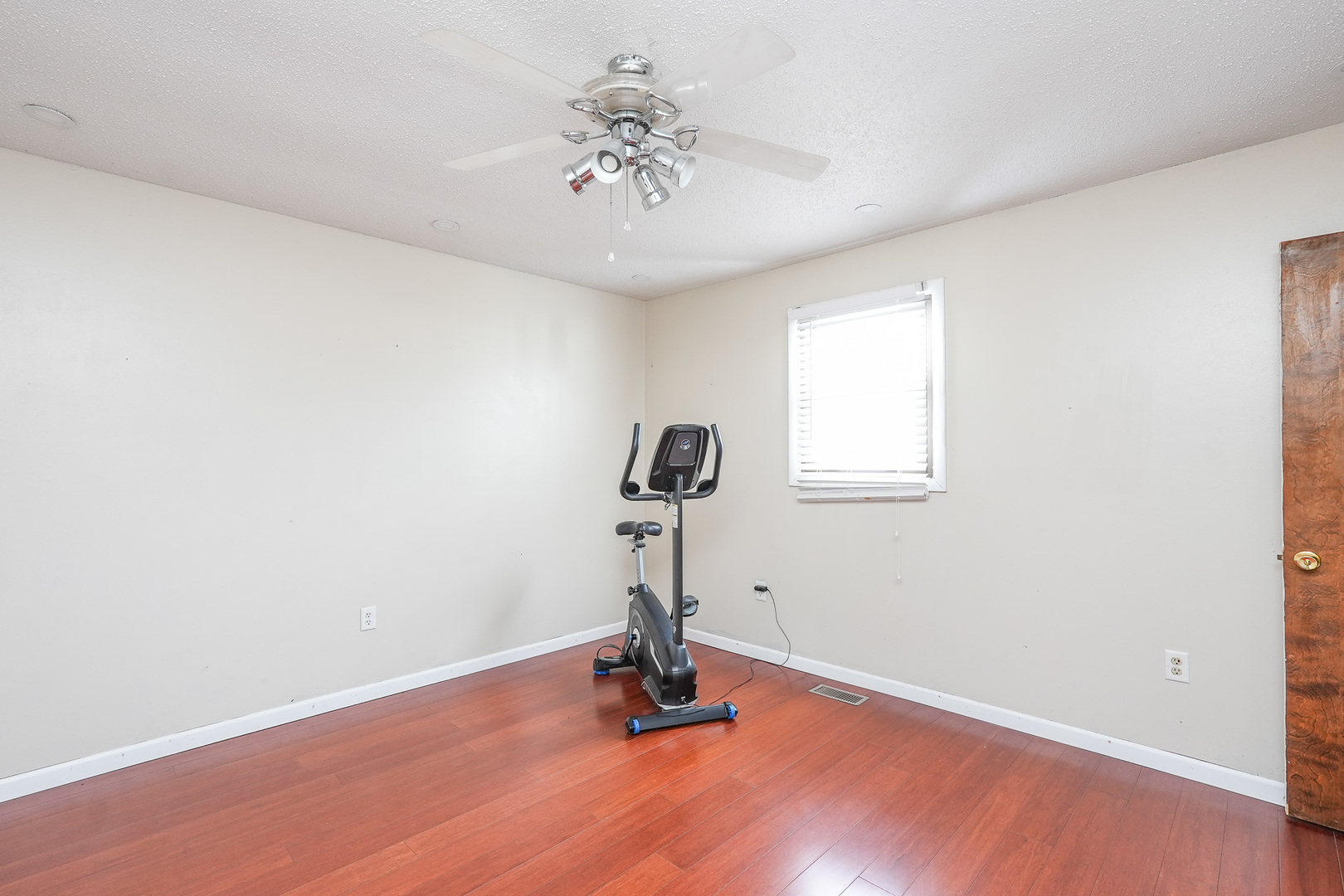 165 East Baker Street Manteno, IL 60950 - Photo 24 of 38 a view of a room with wooden floor