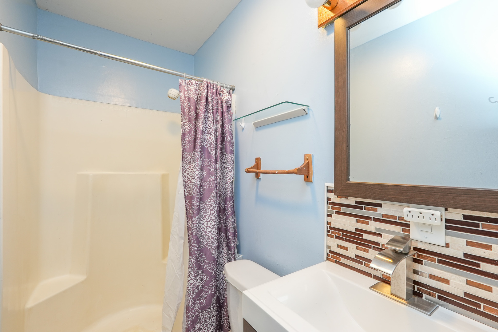 165 East Baker Street Manteno, IL 60950 - Photo 25 of 38 a bathroom with a sink toilet and shower