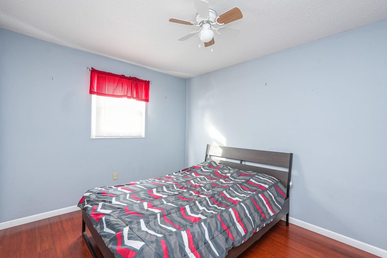 165 East Baker Street Manteno, IL 60950 - Photo 26 of 38 a bedroom with a bed and a dresser