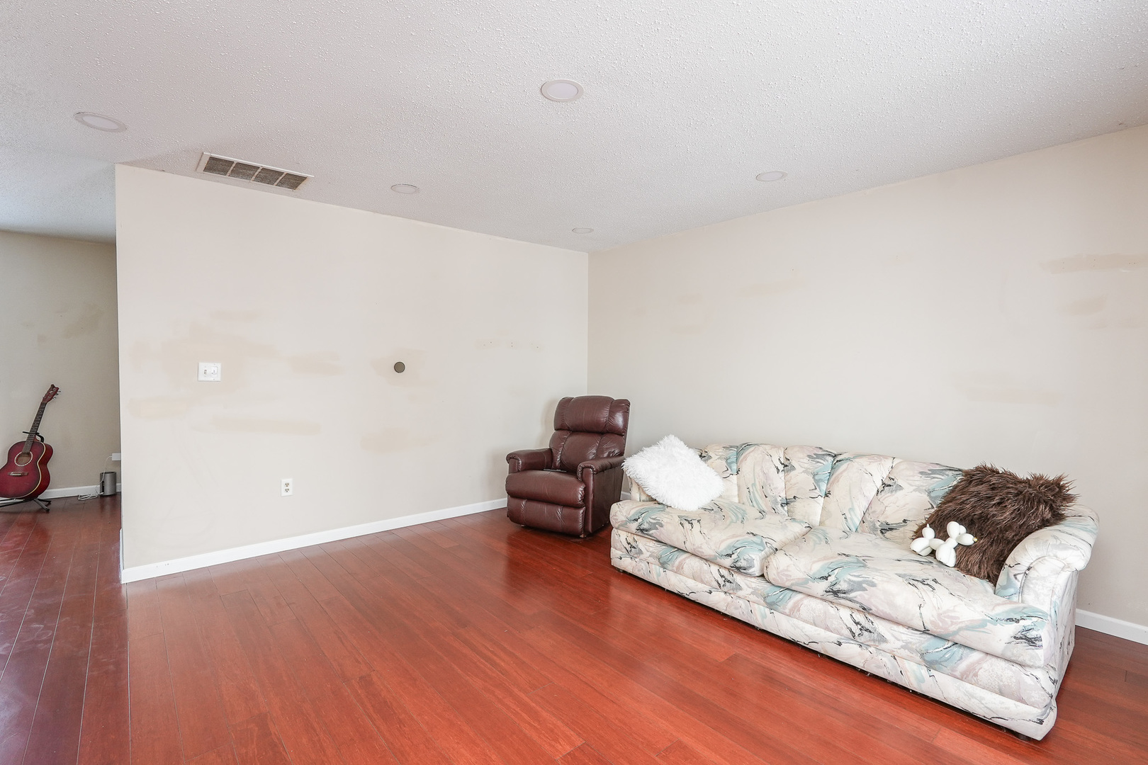 165 East Baker Street Manteno, IL 60950 - Photo 3 of 38 a living room with furniture and a wooden floor