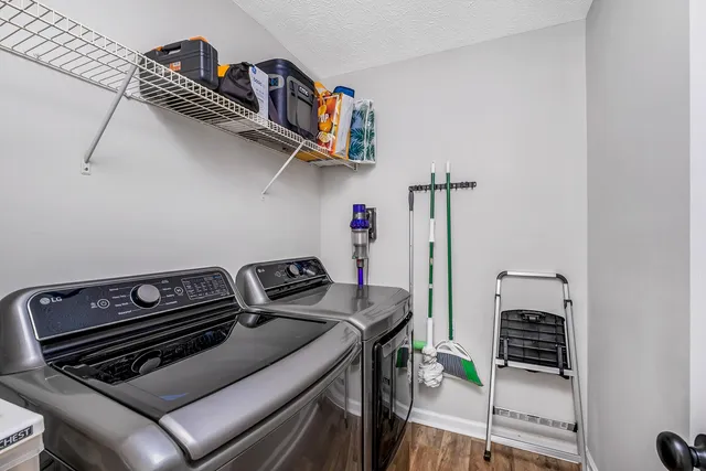 a kitchen with a stove and a microwave