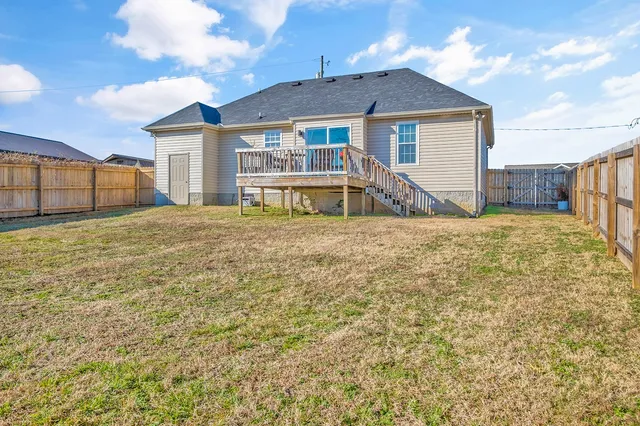 a house view with a garden space